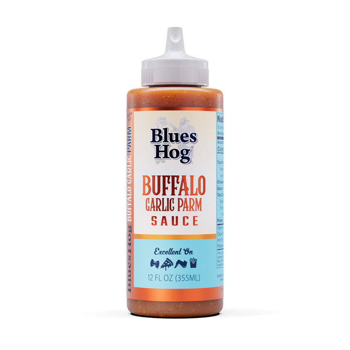 Get a kick out of Blues Hog Buffalo Garlic Parm! This is a mix of fresh garlic, sharp
parmesan cheese, and buffalo-style ingredients creates a complex and tangy sauce perfect for
wings, pizza, fries, and more. | American Fire BBQ & Grilling Supply