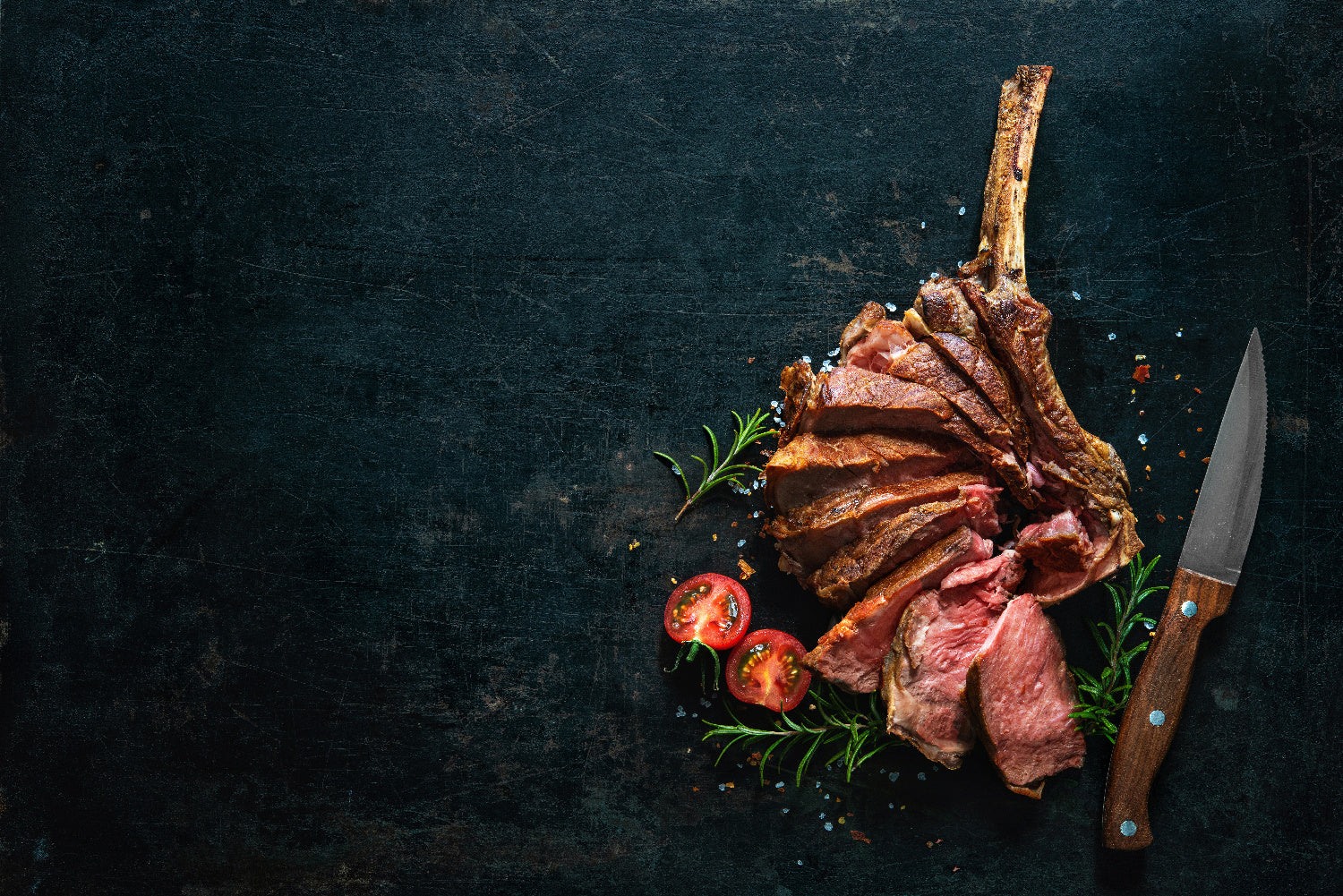 Bone-in cowboy ribeye grilled with deep char and juicy marbling
