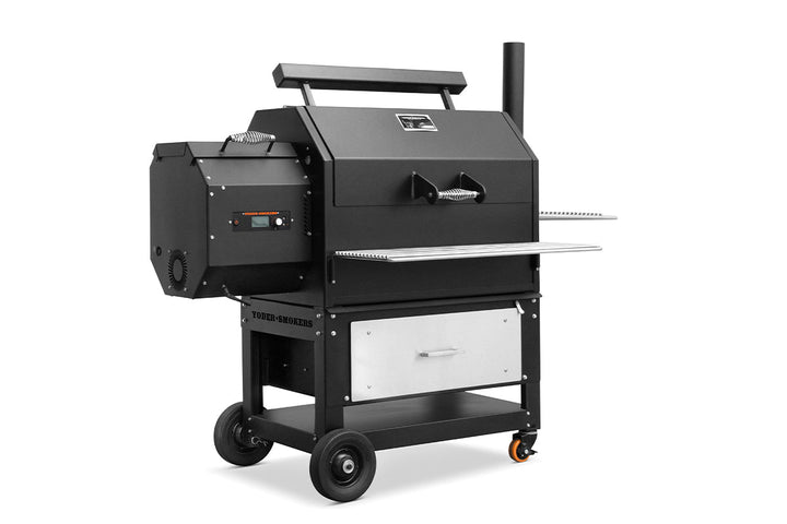 Black barbecue grill on wheels with a white background
